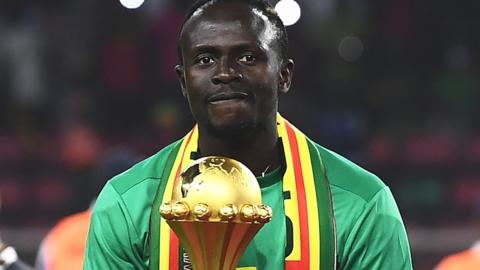 Sadio Mane with the Africa Cup of Nations trophy