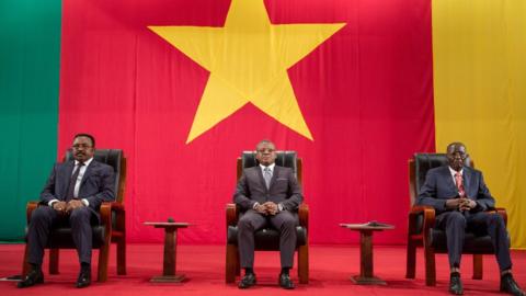 Cameroonian Prime Minister Joseph Dion Ngute (C) attends at the Congress Palace in Yaounde during the opening session of the National Dialogue called by President Biya