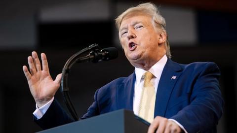 Donald Trump speaking during a "Keep America Great" rally at Sudduth Coliseum