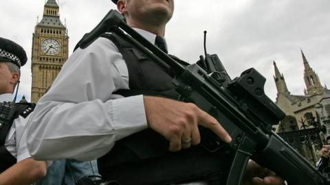 Armed police outside the Houses of Parliament