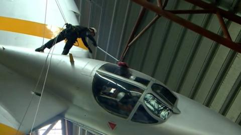 A plane being cleaned at RAF Museum Cosford