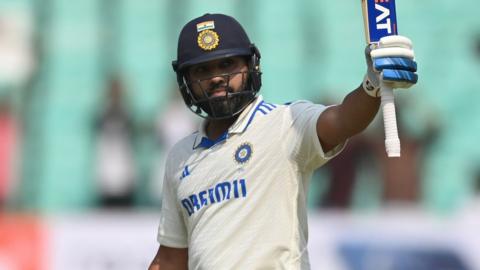 India captain Rohit Sharma celebrates reaching his century