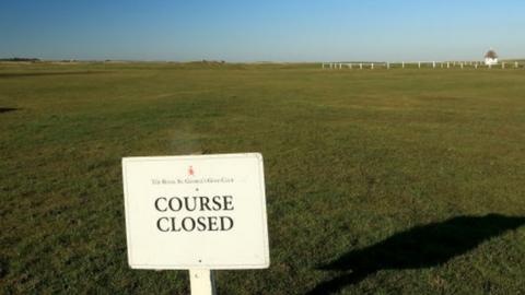 A sign showing Royal St George's golf club to be closed