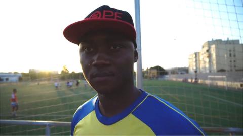 A man wearing a football jersey