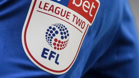 League Two badge on shirt