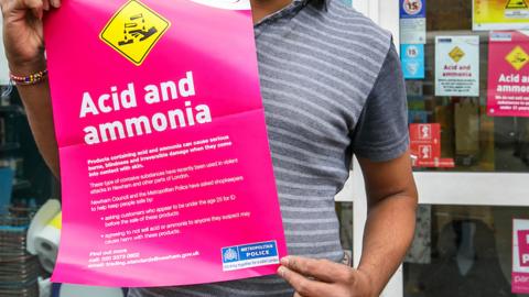 Poster retailers display signalling they have signed up to voluntary scheme to not sell corrosive substances to under 21 year olds.
