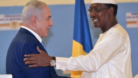 Chadian President Idriss Deby Itno (R) shakes hands with Israeli Prime Minister Benjamin Netanyahu during a meeting at the presidential palace in N"Djamena on January 20, 2019