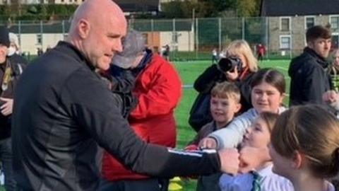 Robert Page with children in Rhondda Fawr