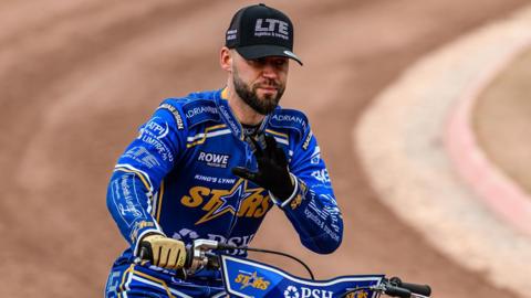 Nicolai Klindt riding a speedway bike on a track.