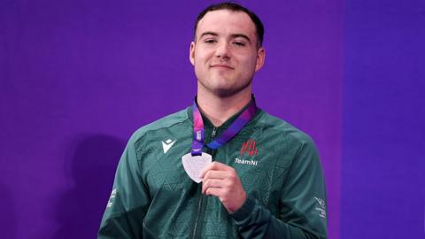 Barry McClements with silver medal