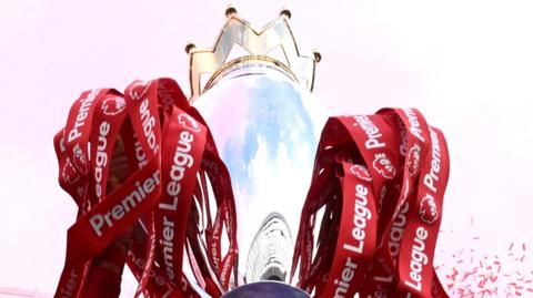 The Premier League trophy