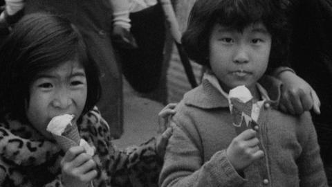 Children in Hong Kong eat ice-cream while celebrating Lunar New Year in 1967.