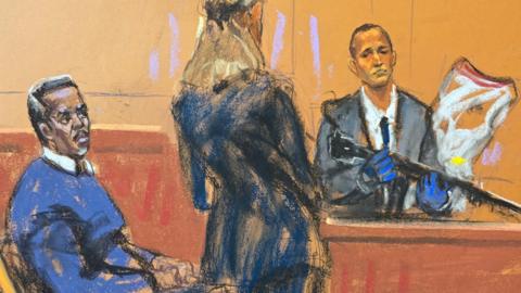 Prosecutor Madison Smizer questions Homeland Security Investigations Special Agent Gerard Gannon as he holds an evidence bag of the upper receivers of AR-15 rifles recovered during a search, at Sean "Diddy" Combs' sex trafficking trial in New York City, New York, U.S., May 20, 2025 in this courtroom sketch. 