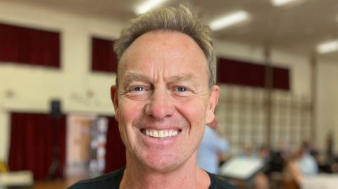 Jason Donovan smiling