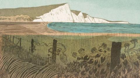 Print of the foreshore and white cliffs in the distance, with a frayed looking fence in the foreground