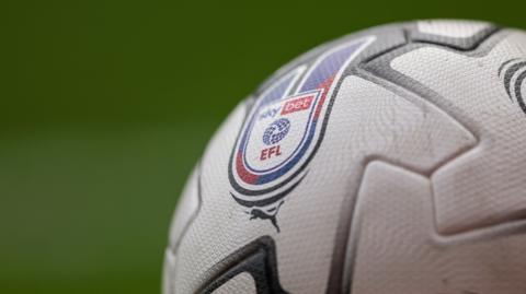 A close-up of an EFL football