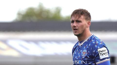 Jack Diamond in action for Carlisle