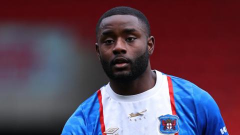 Matthew Dennis in action for Carlisle United