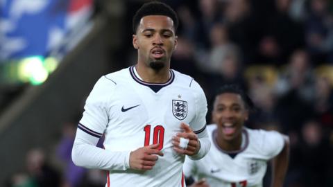 Ethan Nwaneri celebrates scoring