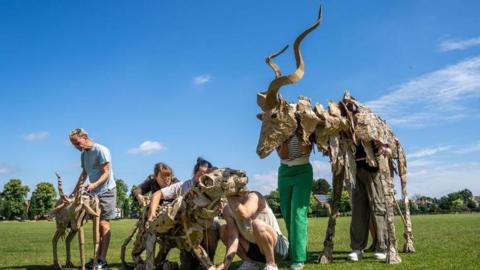 UAL students with the puppets 