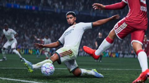 A screenshot from EA's EA FC 27, showing England's Jude Bellingham in white on the football pitch, saving a pass from the opposing team in red.
