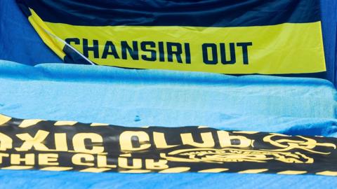 Chansiri out banner at Hillsborough