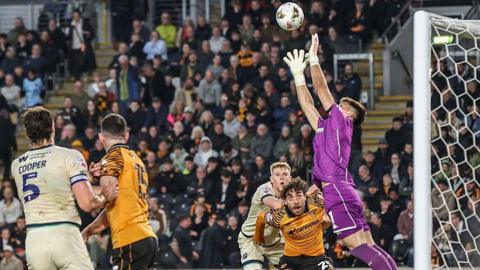 Hull City keeper Ivor Pandur comes off his line to catch a high cross