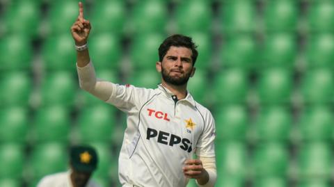 Shaheen Afridi celebrates a wicket with his finger pointing skywards