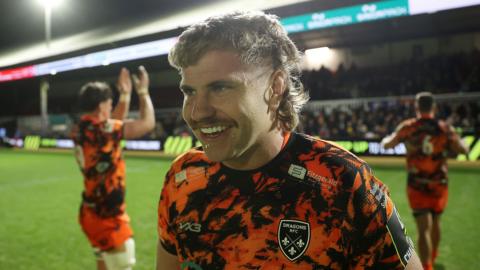 Dragons forward Aaron Wainwright smiles after the Challenge Cup win against Lyon at Rodney Parade