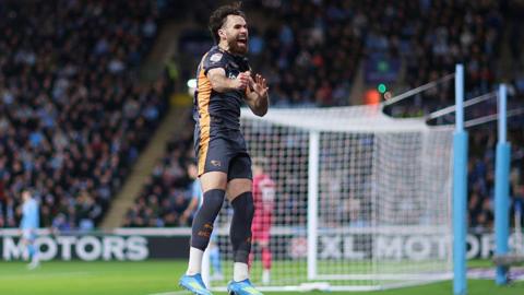 Derby goalscorer Ben Brereton Diaz jumps into the air in celebration