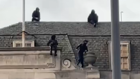 Group of boys spotted on the former Debenhams store in Nottingham