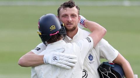 Luke Hollman celebrates century