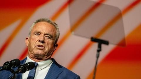 Robert F Kennedy Jr pictured speaking at a Bitcoin summit 