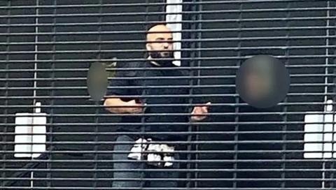 Image of attacker outside Manchester synagogue before he was shot