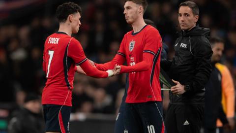 Phil foden and Cole Palmer wearing England kits