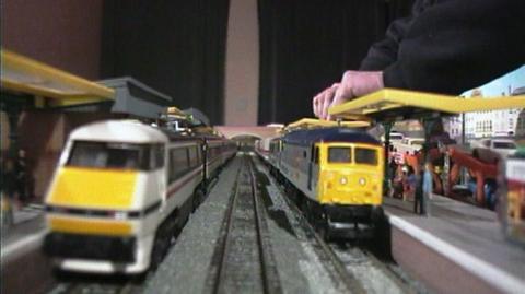 Two trains on a model railway set 