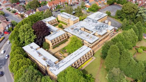 College Court from above with trees surrounding the complex