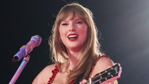 Taylor Swift performs onstage during in Paris during The Eras Tour.