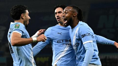 Man City players celebrate