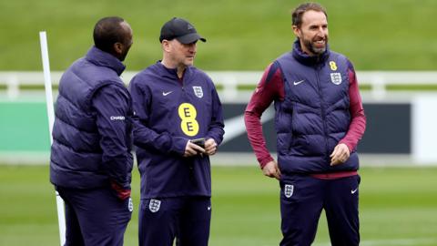 England manager Gareth Southgate with assistant coaches Jimmy Floyd Hasselbaink and Steve Holland during training