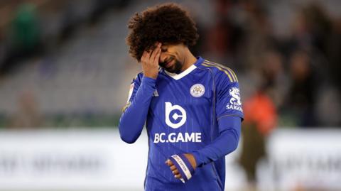 Hamza Choudhury of Leicester City reacts after the club are relegated to League One
