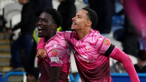 Bolton Wanderers' Amario Cozier-Duberry (left) celebrates with team-mate Josh Dacres-Cogley