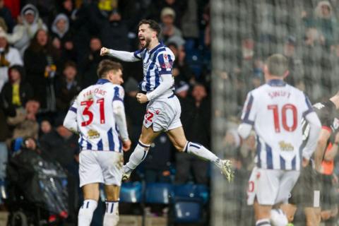 Mikey Johnston celebrates his second goal for Albion against Bristol City