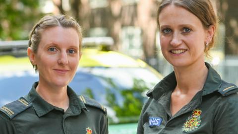 Nicola Frayn and Camella Main seen in their LAS uniform smiling 