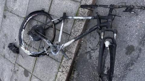 A charred e-bike
