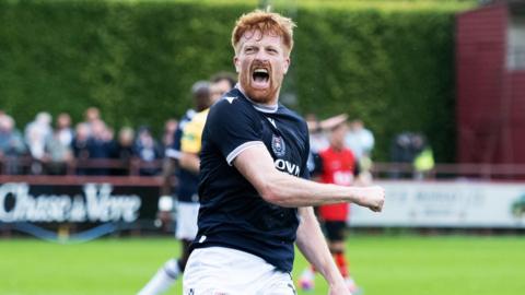 Dundee's Simon Murray celebrates