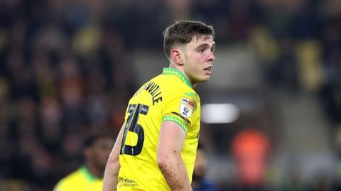 Norwich City's Ruairi McConville looking forward in home kit
