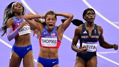 Gabby Thomas celebrates Olympic 200m gold