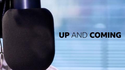 Radio 1 microphone against a grey background