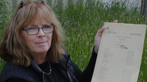 The picture shows Ewbank's consultant specialist Denise Kelly holding the original script from the lost The Morecambe & Wise episode